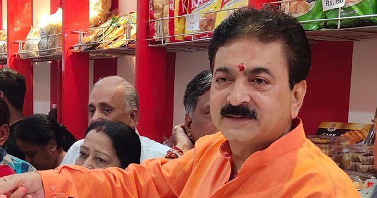 Balram Thawani, BJP MLA from Naroda in Gujarat thrashed a woman on a busy road in open daylight.